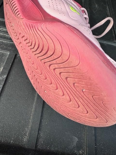 The worn-down herringbone tread on the NDurance outsole of the New Balance 696v5 after several months of play