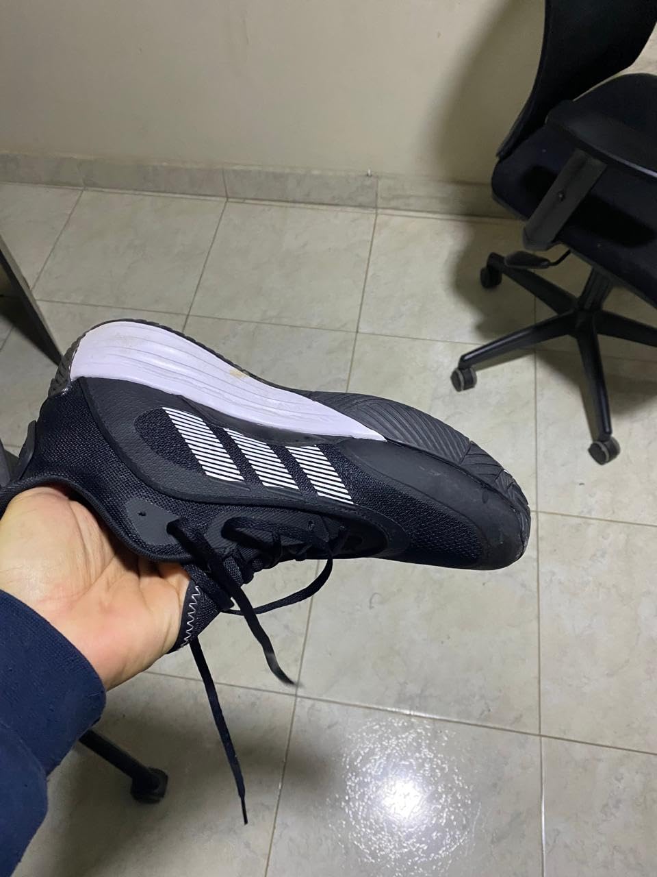 Adidas Own The Game 3.0 basketball shoes on court action shot showing grip and stability