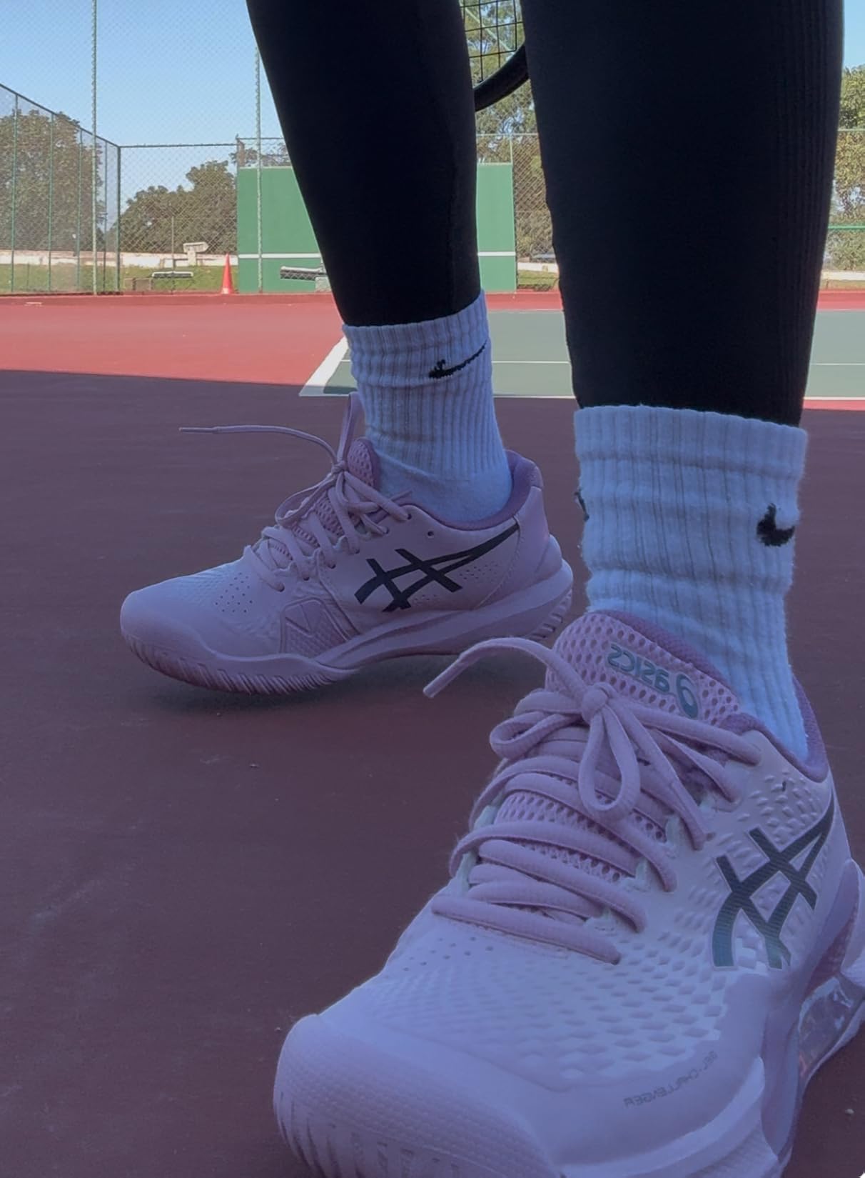 ASICS Gel-Challenger 14 tennis shoes on court during play