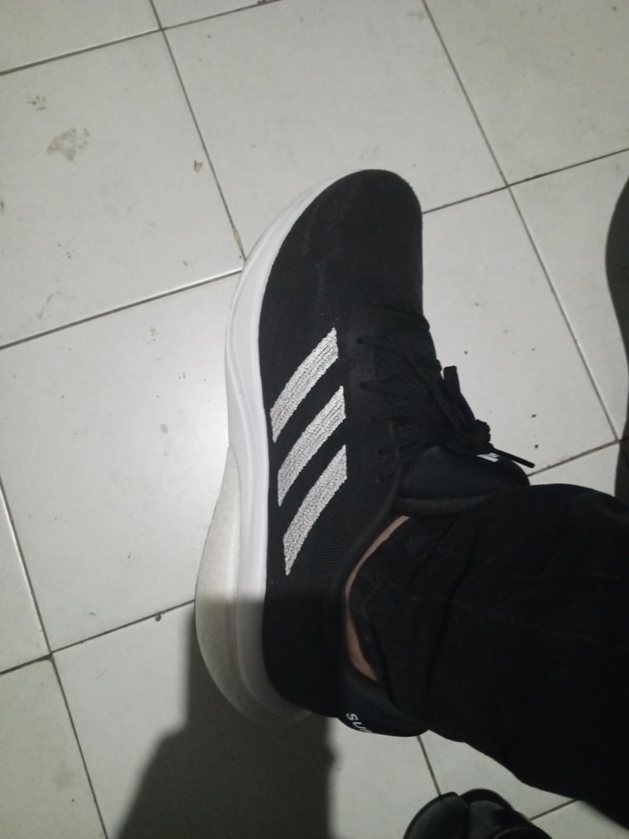 Adidas Supernova 3 side profile showing hybrid midsole design and reflective elements