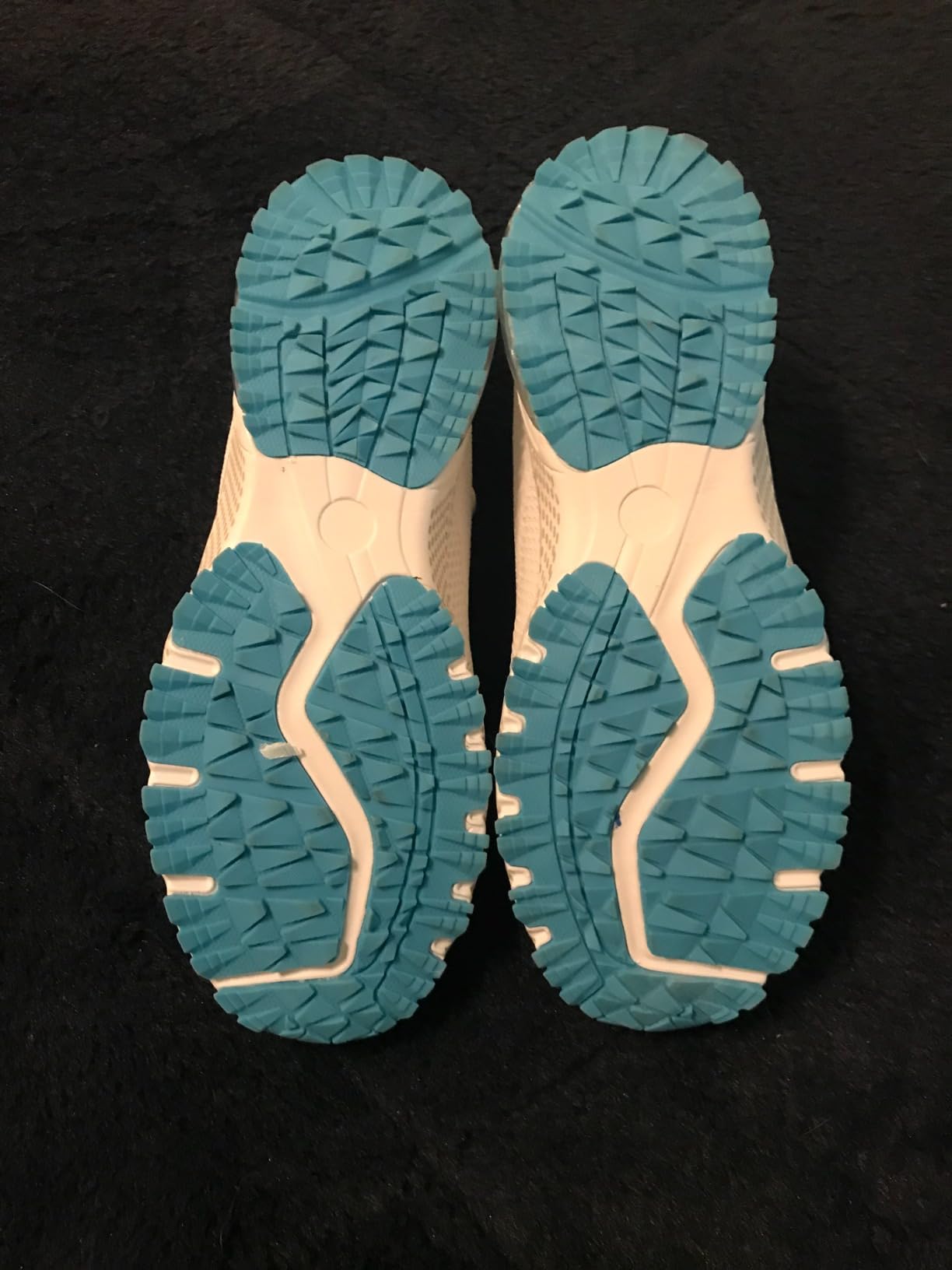 ZOOMCO Women's sneakers showing detailed side view with mesh ventilation and cushioned midsole