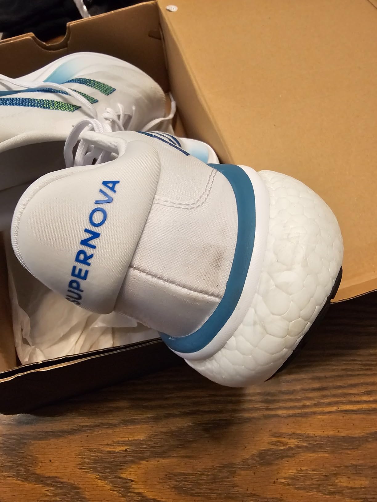 Adidas Supernova 3 mesh upper construction showing breathable design and lace closure system