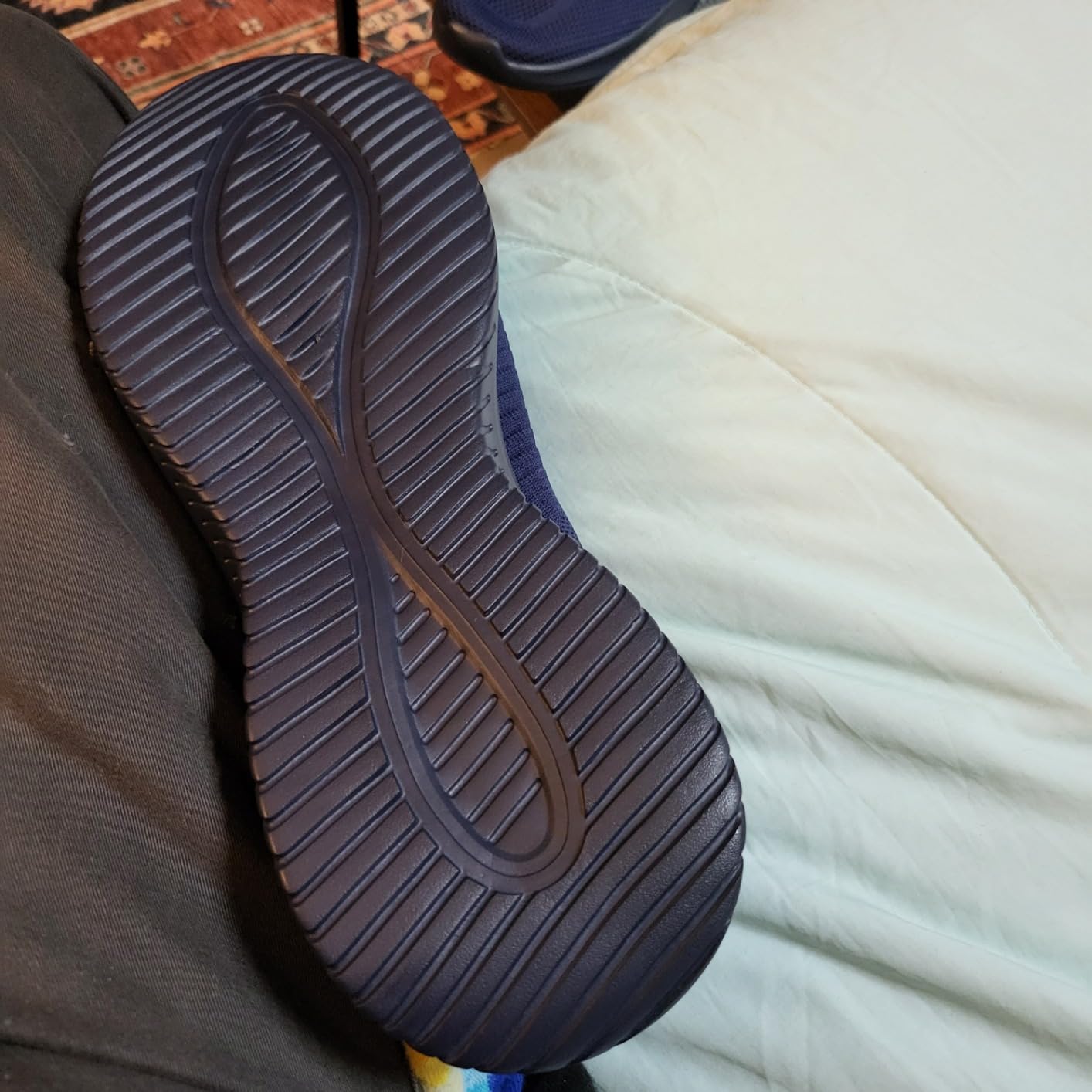 Close-up detail of LCGJR walking shoes showing breathable mesh construction and lacing system