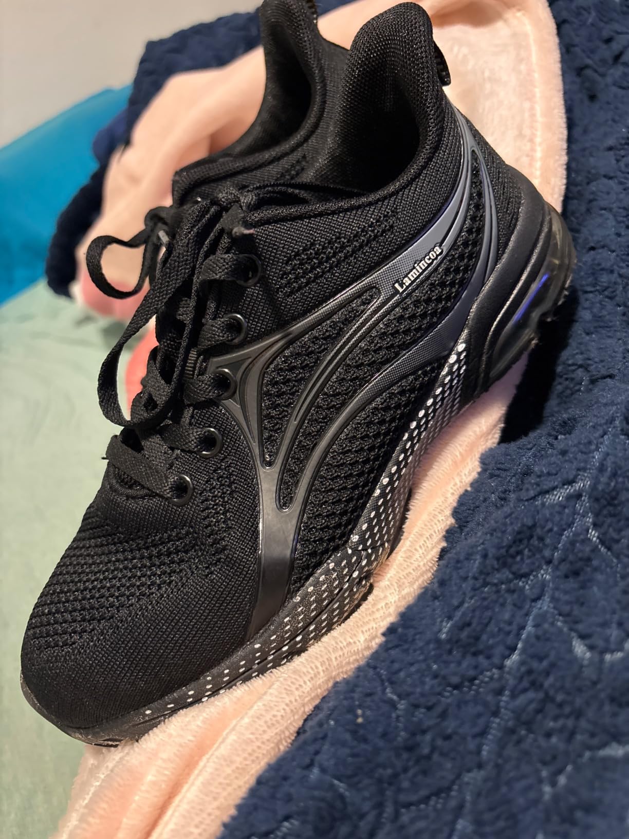 ZOOMCO Women's sneakers showing mesh construction and cushioned sole design details