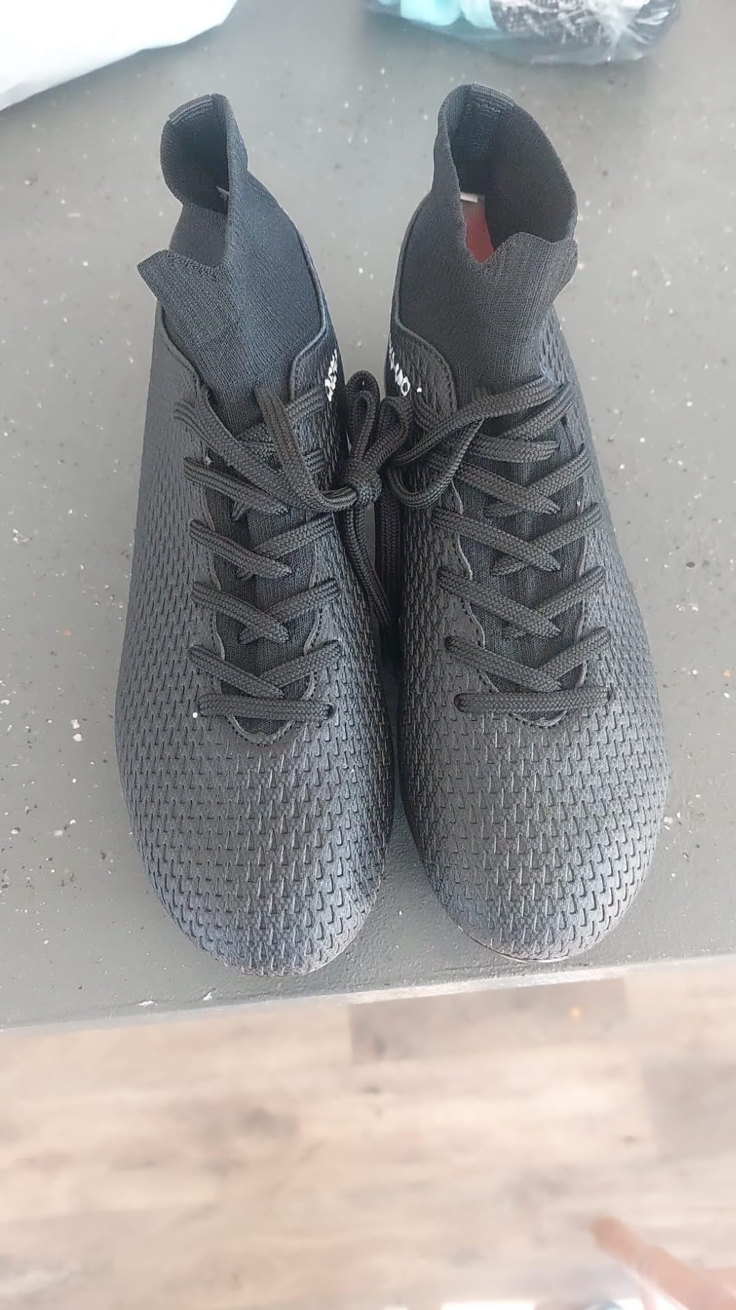 Soccer cleats high-top design detail showing ankle collar