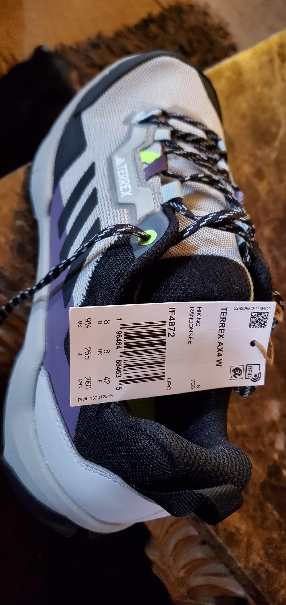 Side profile view of Adidas Terrex AX4 showing heel counter and midsole design