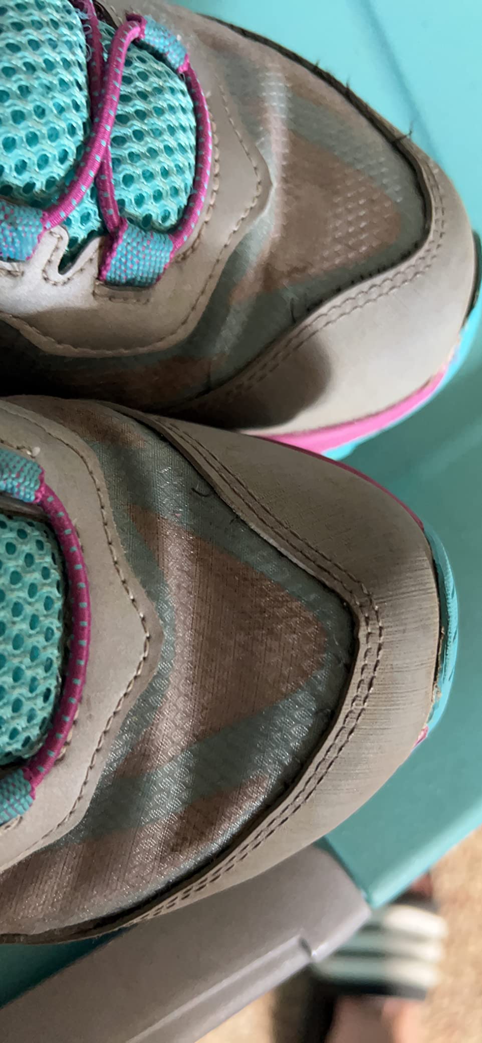 Merrell kids hiking shoe showing wear patterns after trail use