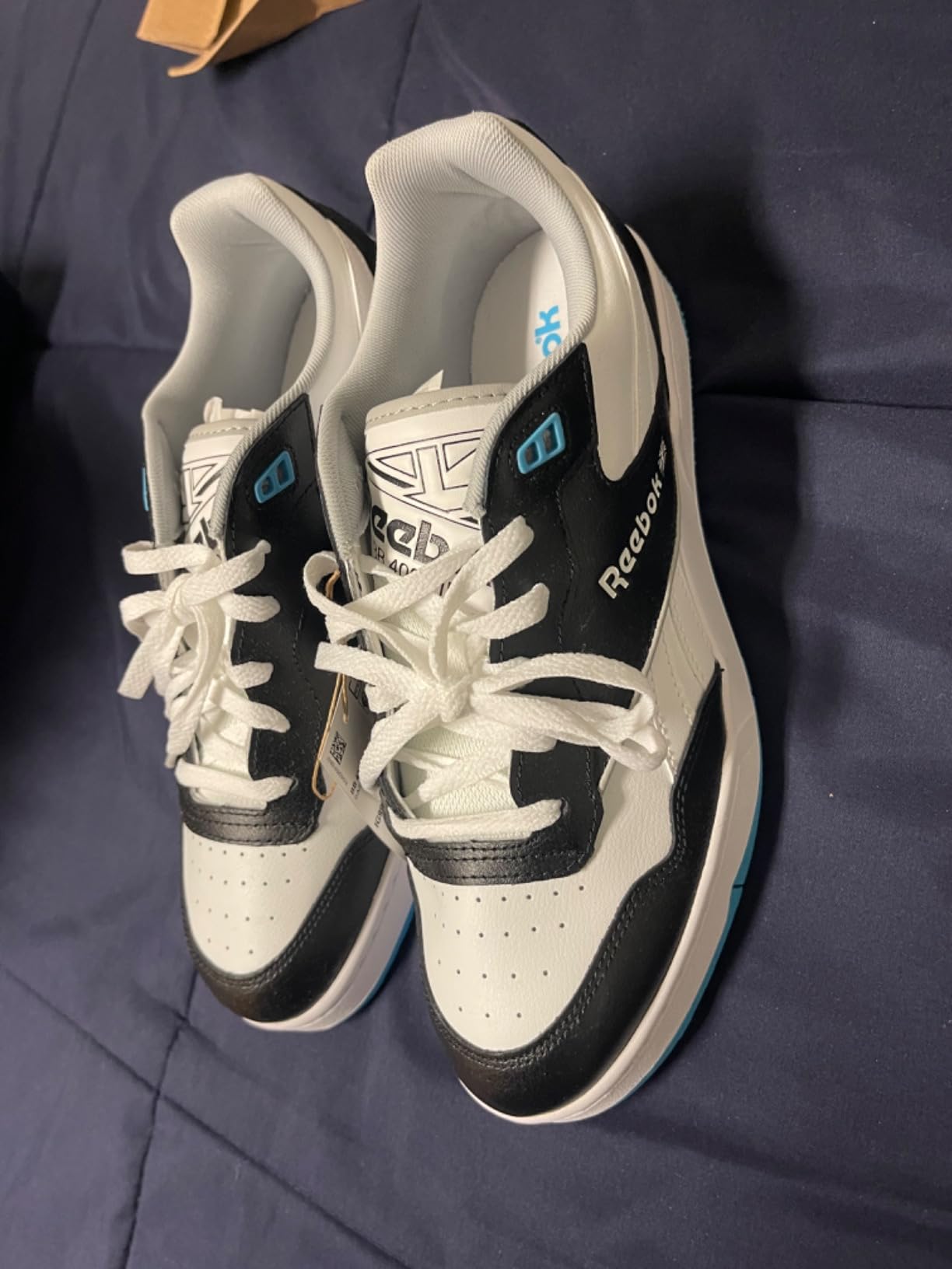 Reebok BB 4000 II shown in different colorways demonstrating style versatility