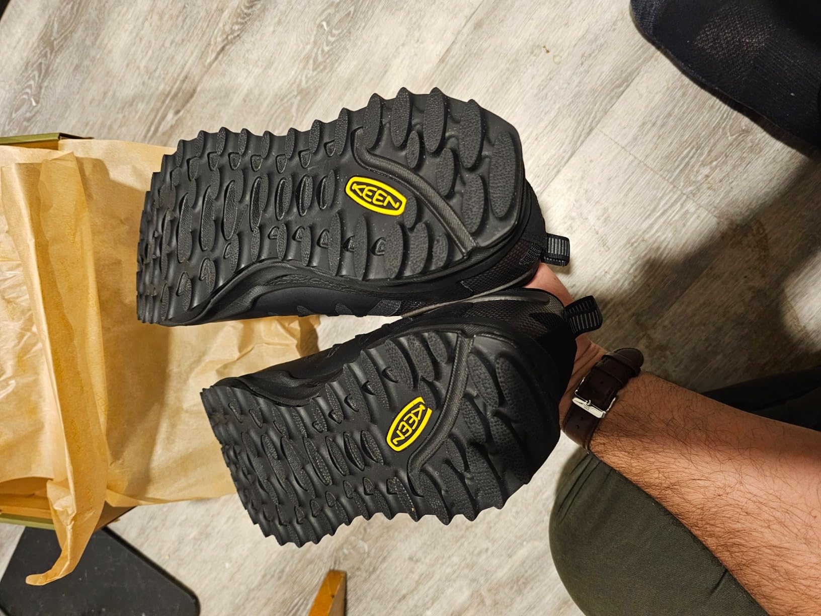 KEEN Zionic shoes in muddy trail conditions showing grip and traction
