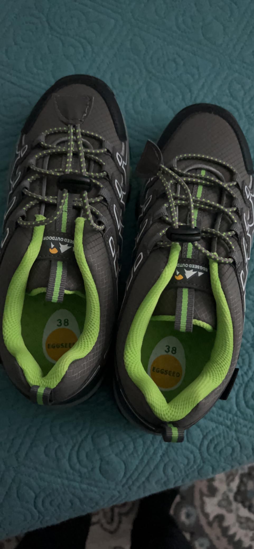 EGGSEED kids hiking shoes being tested outdoors showing grip and traction on trail surfaces