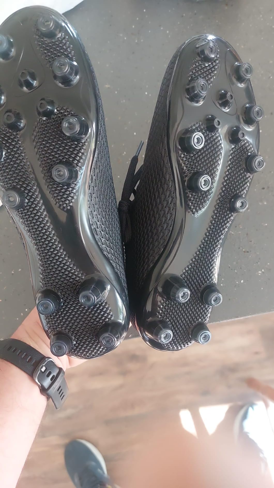 TPU outsole showing stud configuration for multi-surface grip