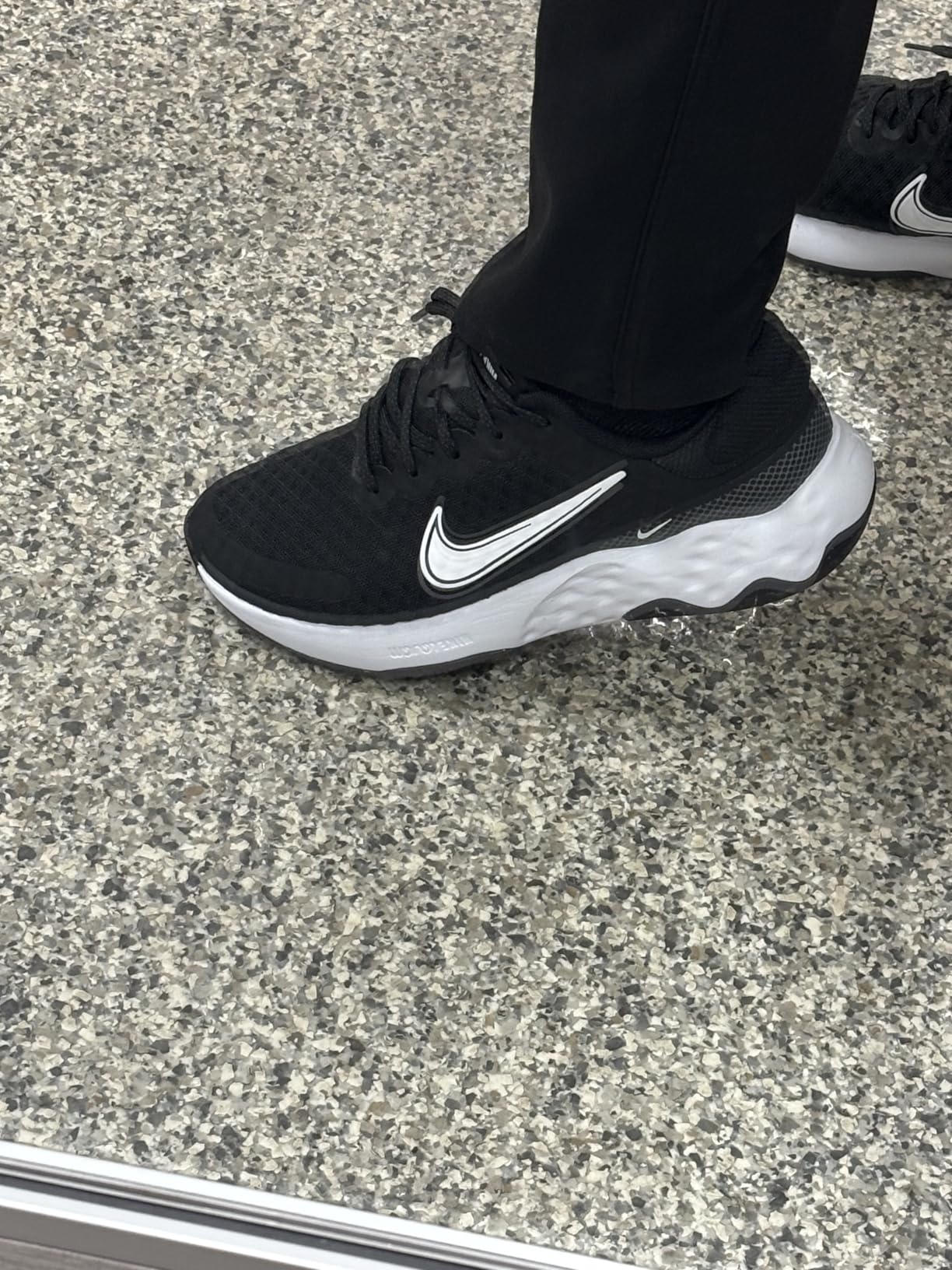 Nike Women's Road Running Shoes in action showing traction pattern and side profile
