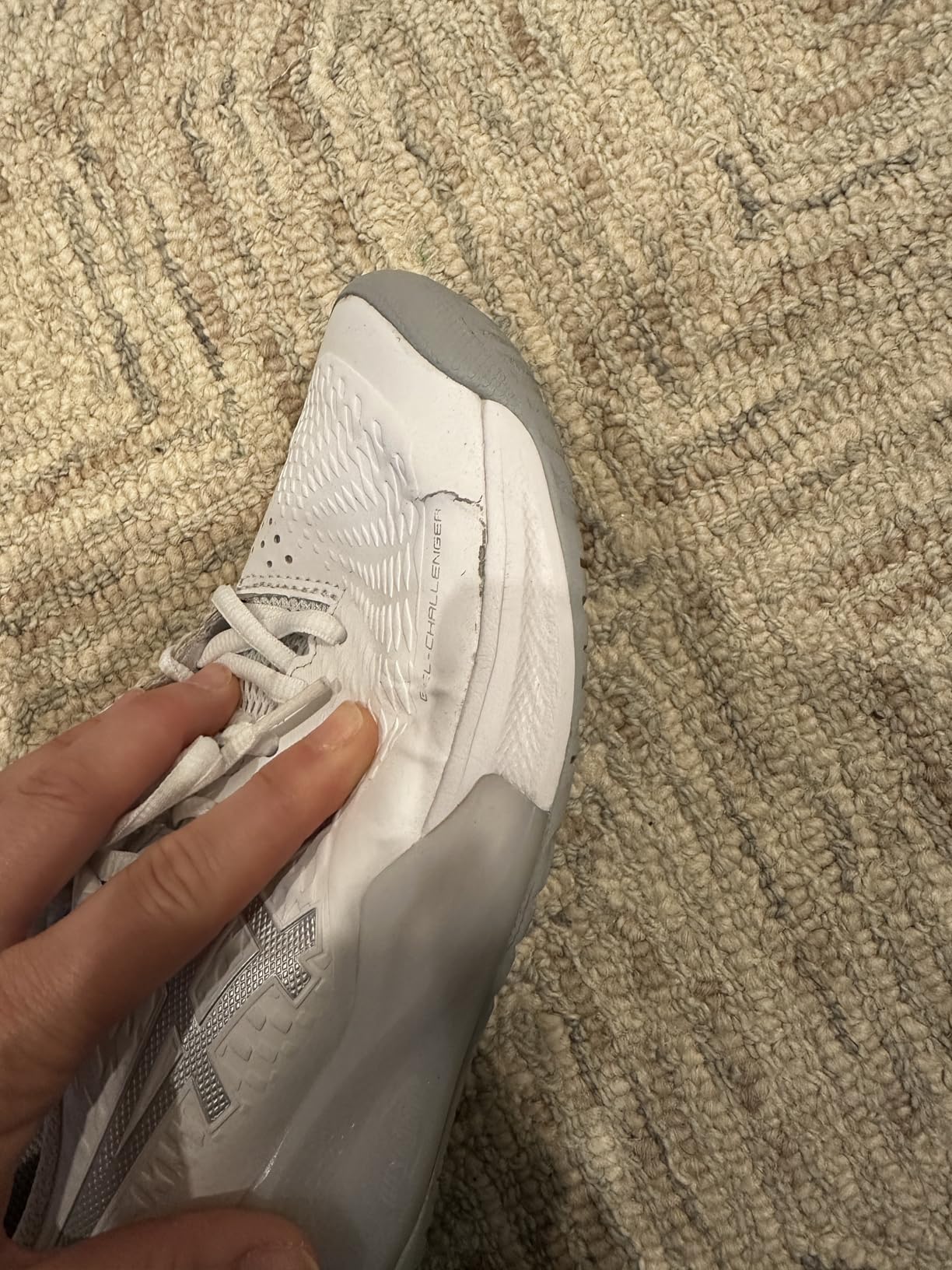 ASICS Gel-Challenger 14 outsole showing AHARPLUS rubber traction pattern