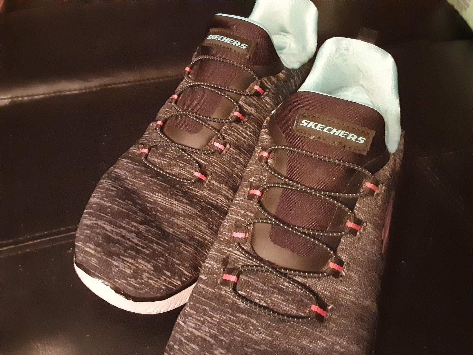Skechers Summits sneakers worn during daily activities showing real-world wear patterns and comfort performance