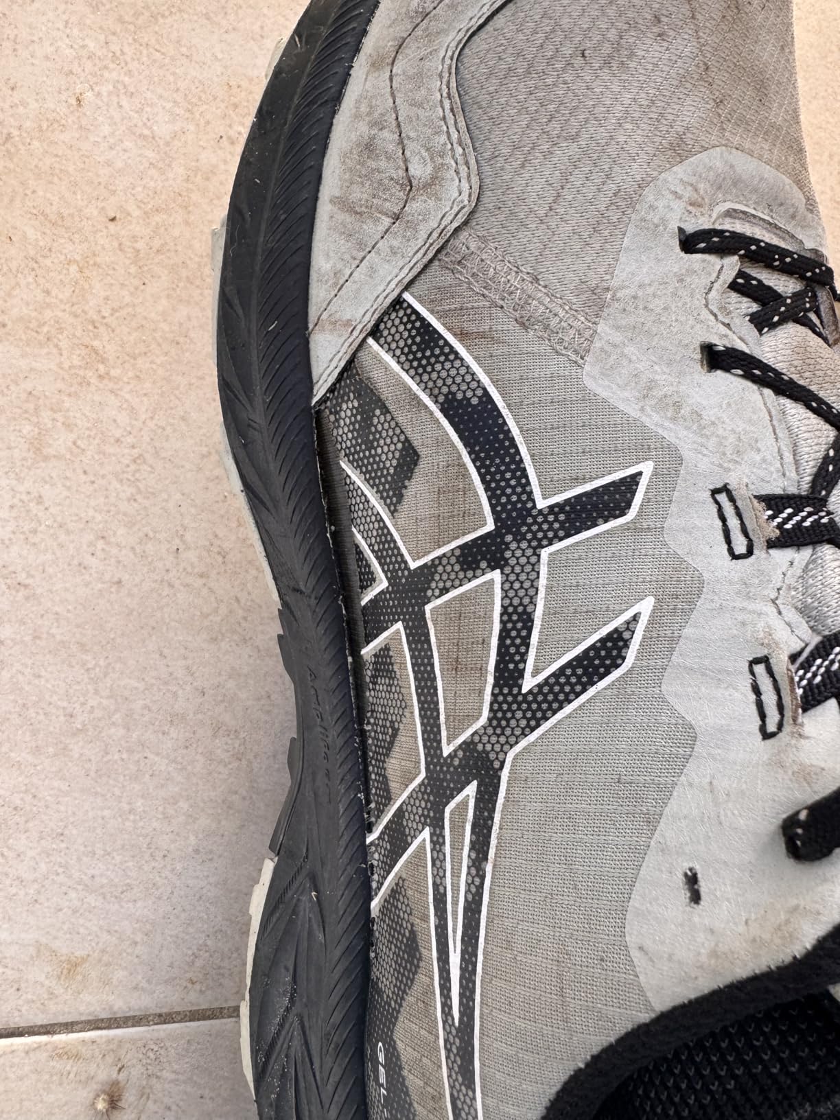 ASICS Gel-Venture 10 after trail use showing wear patterns and durability