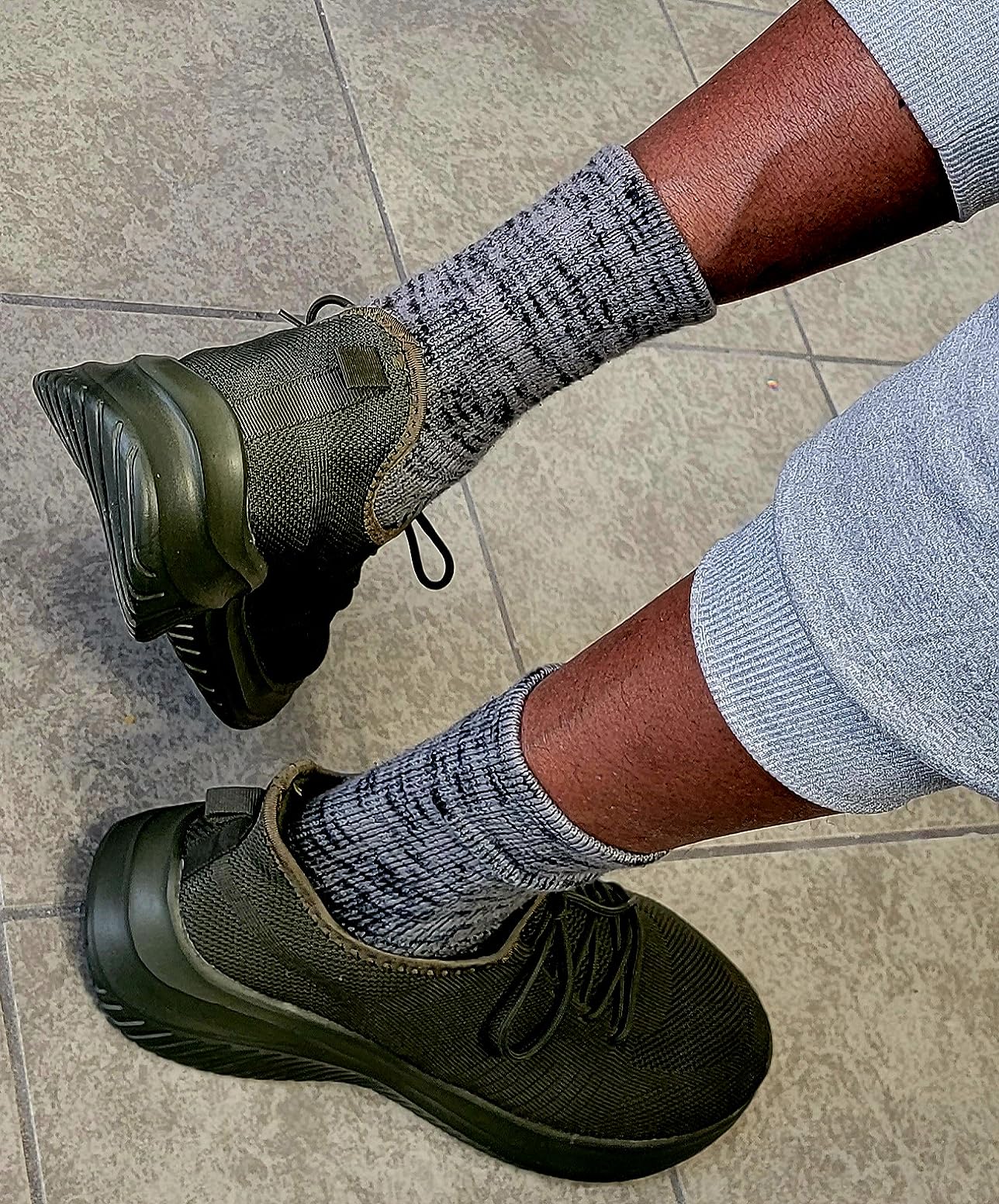 Multiple colorways of LCGJR walking shoes showing size and style options available