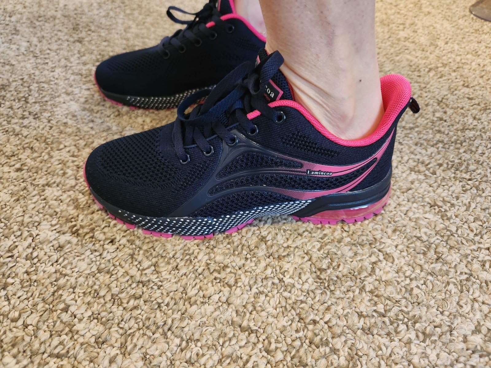 ZOOMCO sneakers black and pink colorway showing versatile design for multiple activities