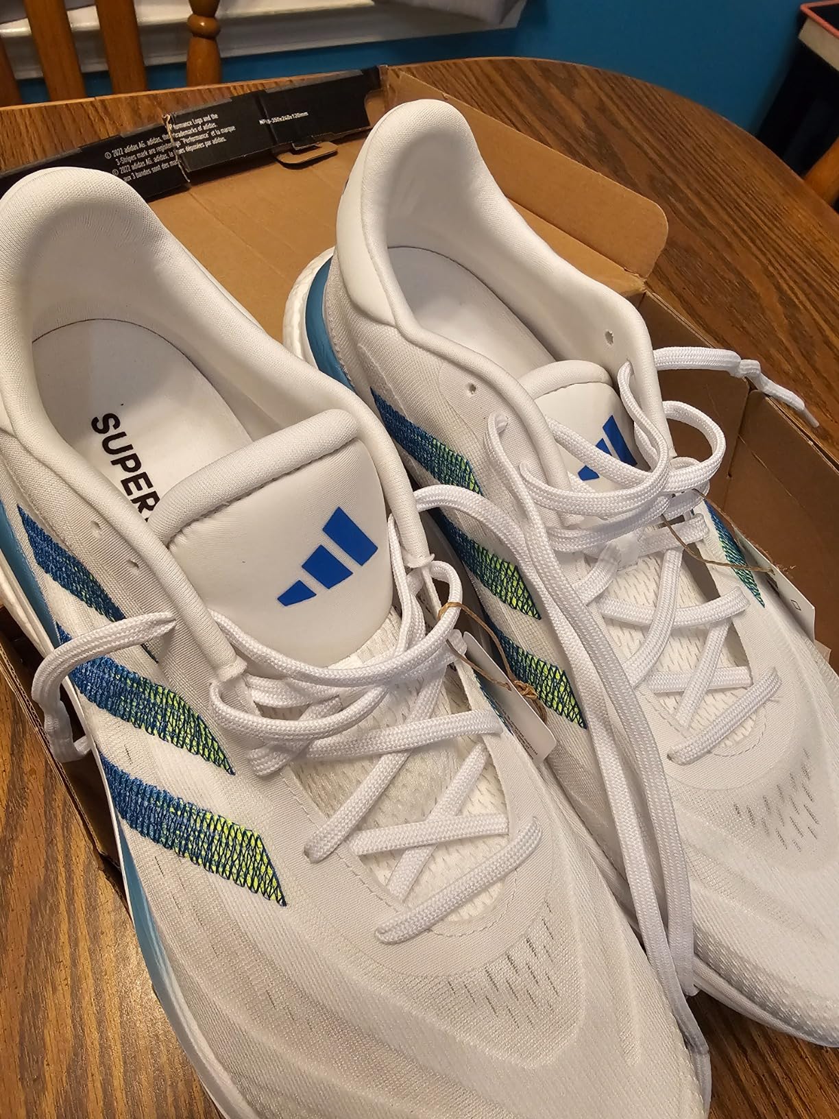 Adidas Supernova 3 action shot showing running performance and reflective details for visibility