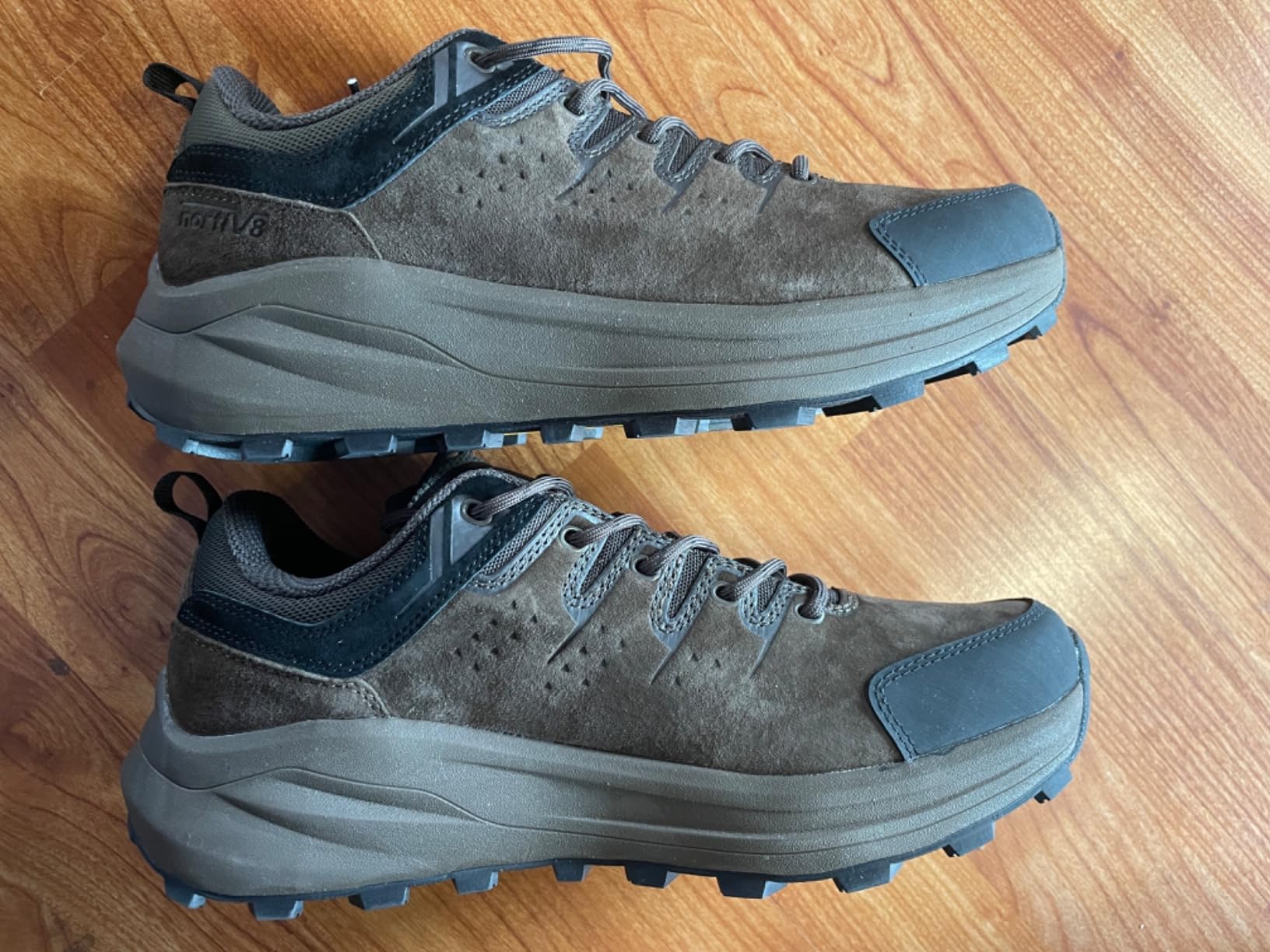 NORTIV 8 hiking shoes during field testing showing quarter scale comparison and thick EVA midsole profile