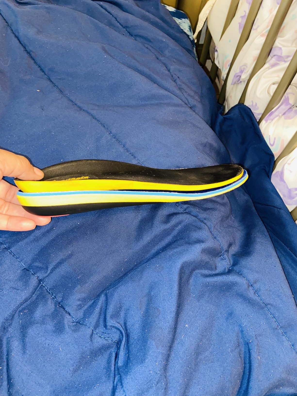 Close-up view of VALSOLE orthotic insole arch support curve and heel cup design