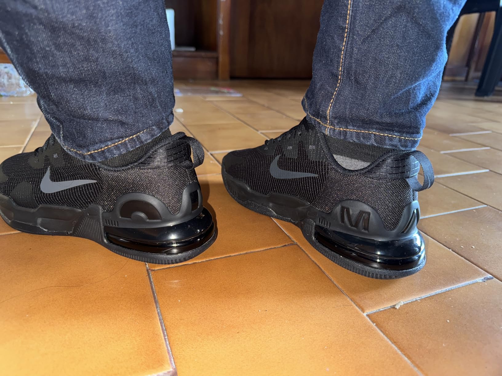 Nike Air Max Alpha heel view showing cushioning technology and brand details