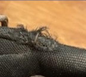 Bottom view of Merrell Moab Adventure Lace showing Vibram outsole tread pattern and rubber toe cap protection