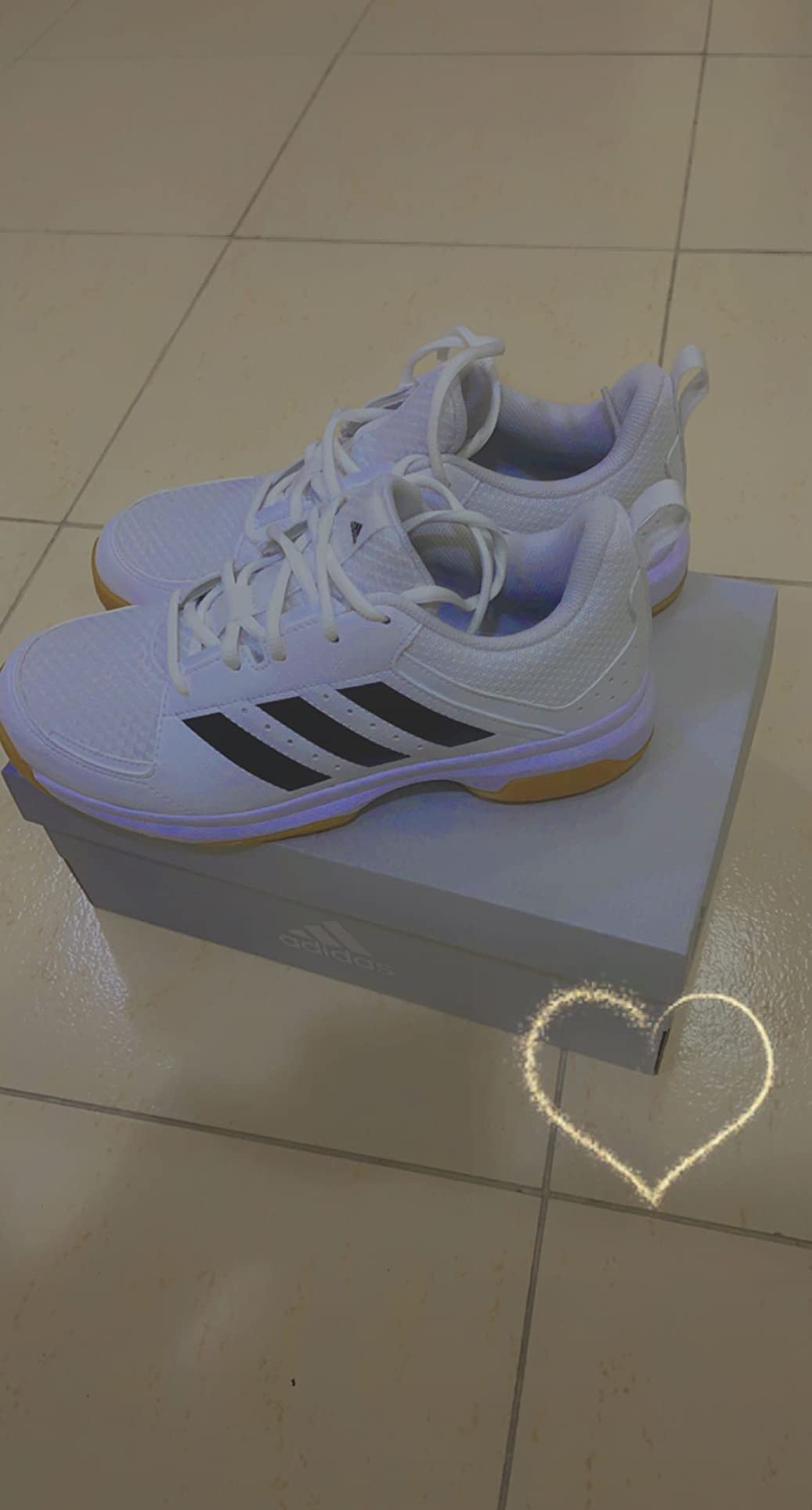 adidas Ligra 7 lifestyle wear showing versatility beyond court sports