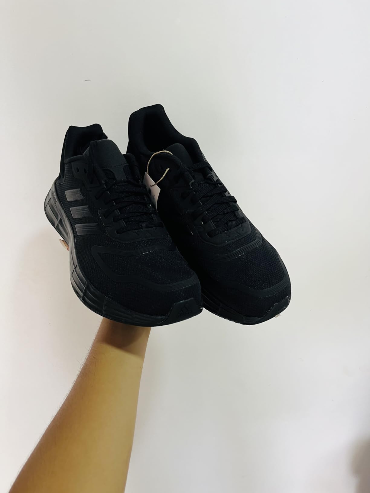 Duramo SL 2.0 side profile showing mesh breathability and three stripes design
