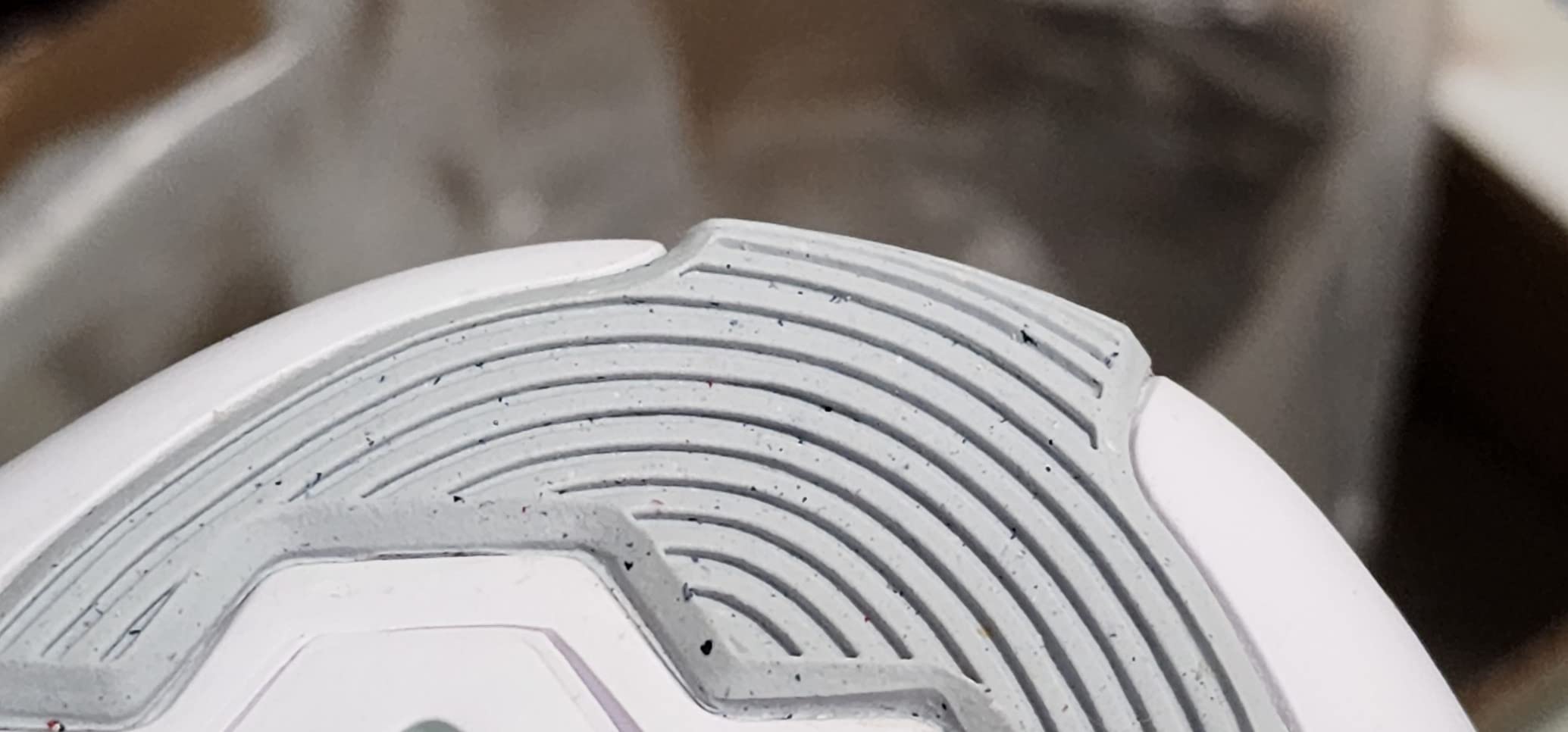 Close-up view of Nike Women's training shoe showing mesh upper construction and Flywire cable details