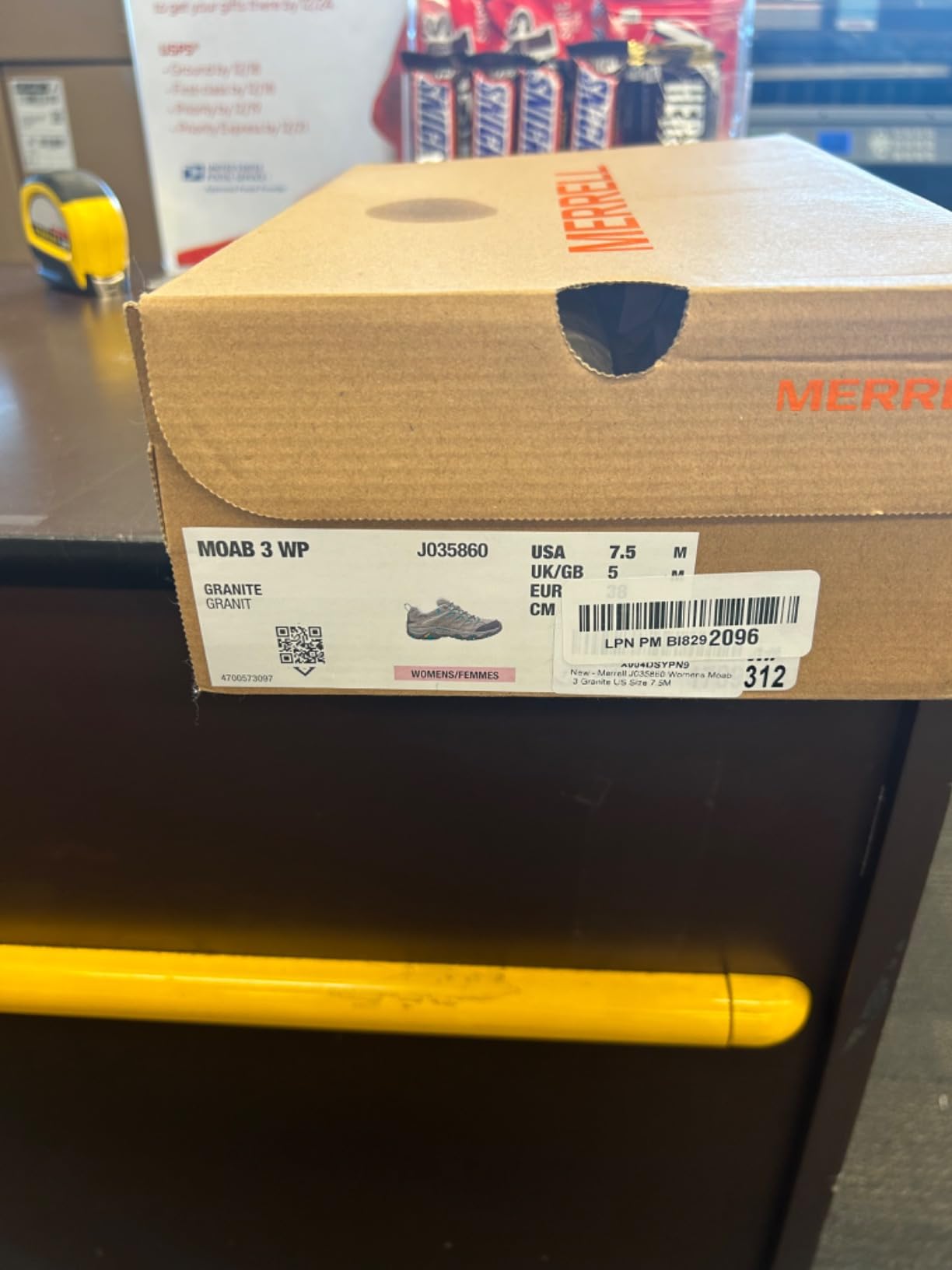 Merrell Moab 3 boots on rocky terrain showing traction and stability on challenging surfaces