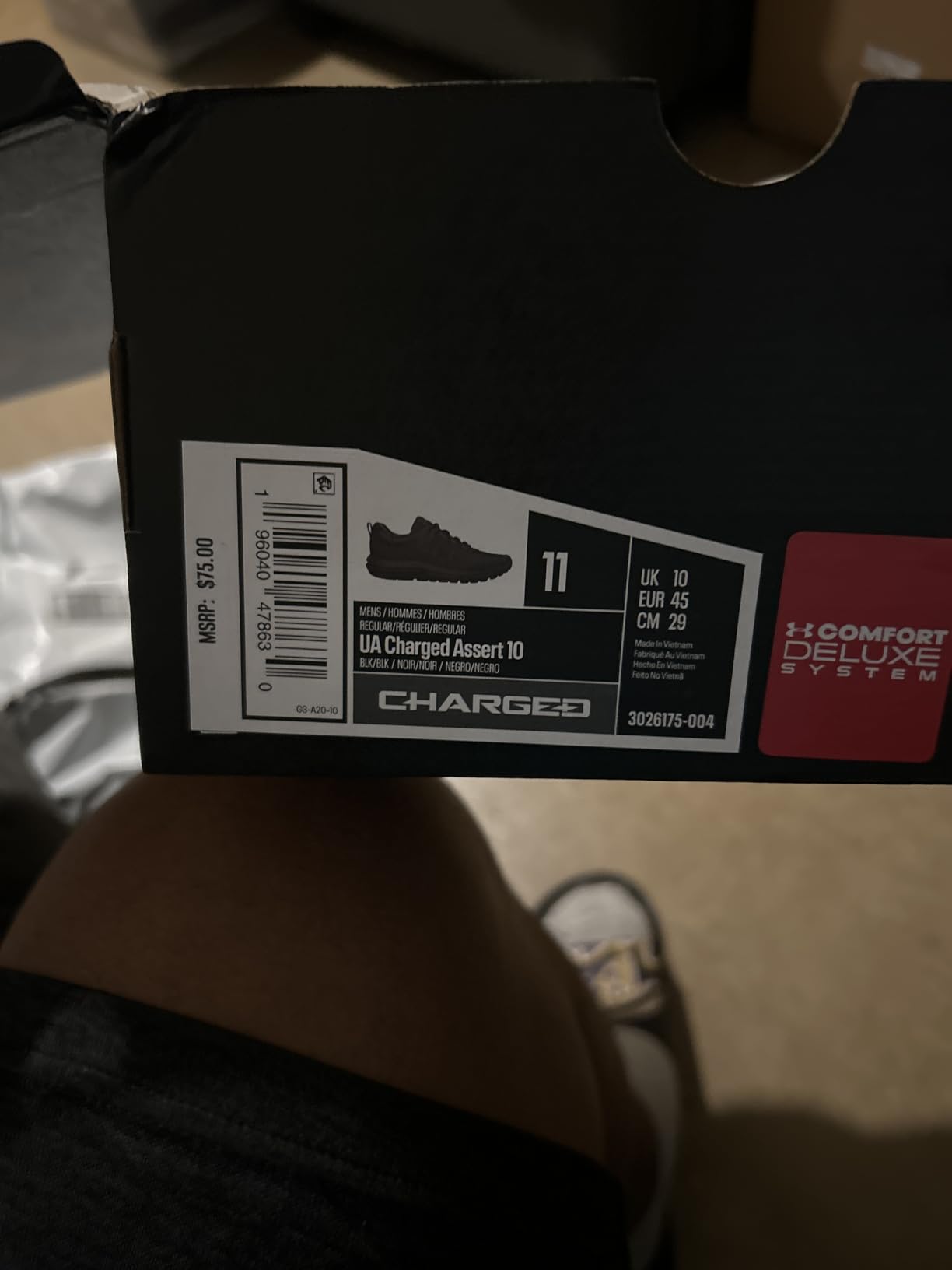 Under Armour Charged Assert 10 worn with thick socks showing comfortable fit