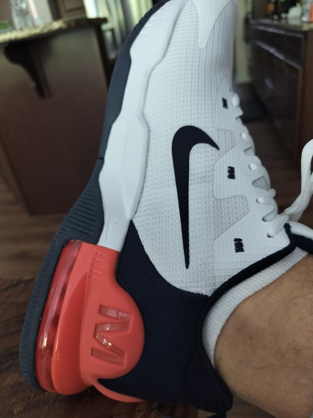 Nike Air Max Alpha Trainer 5 white navy orange colorway on foot during gym workout