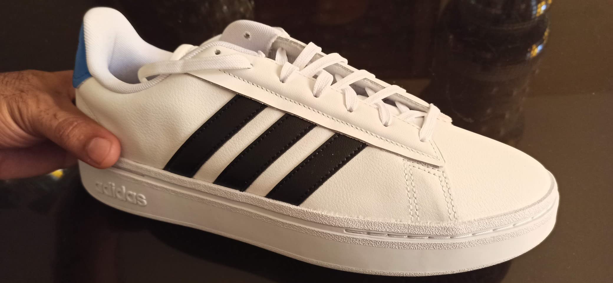 Adidas Grand Court Alpha in real world setting showing casual wear versatility