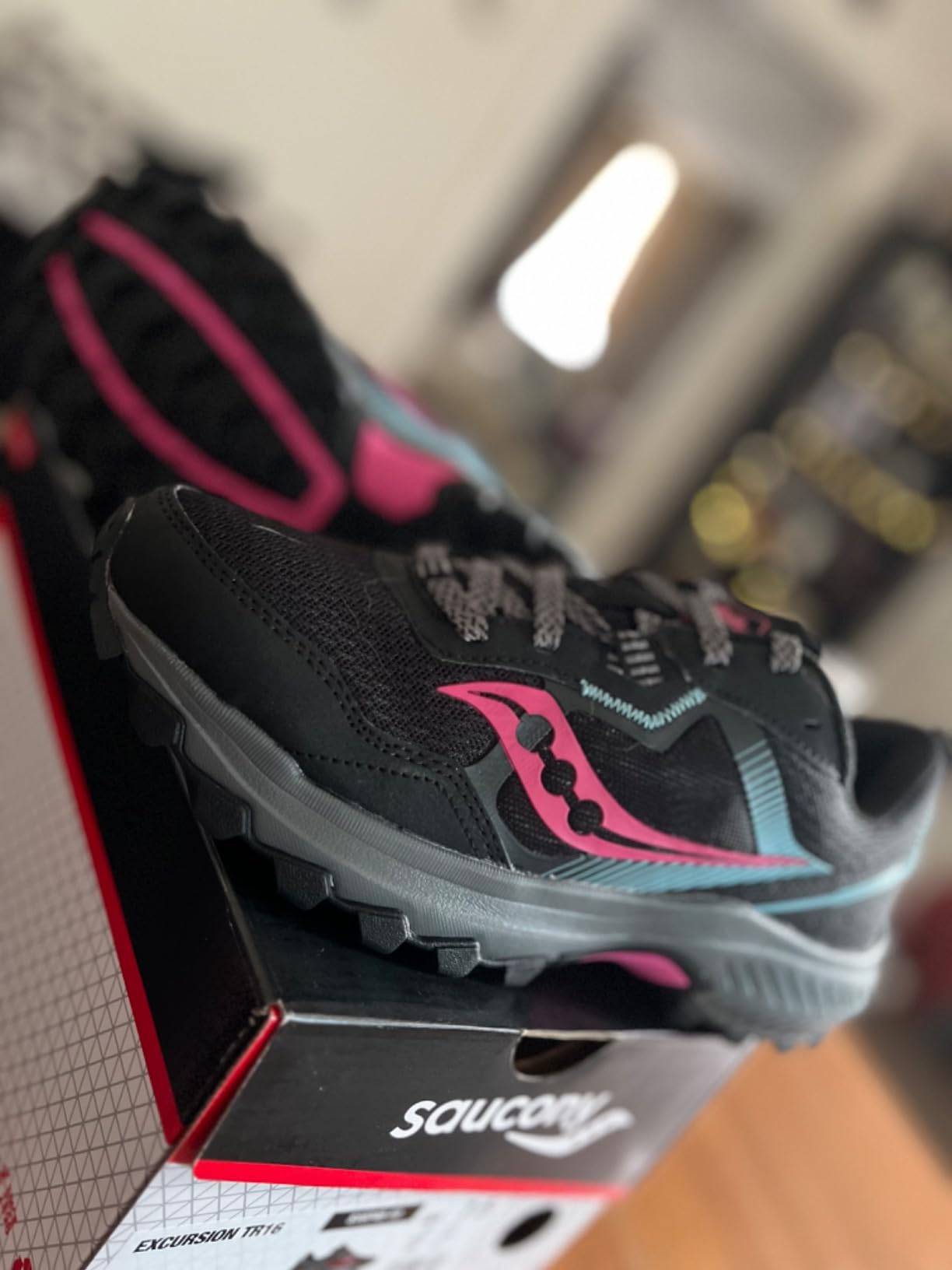 Side view of Saucony Excursion TR16 showing profile and carbon rubber outsole pattern