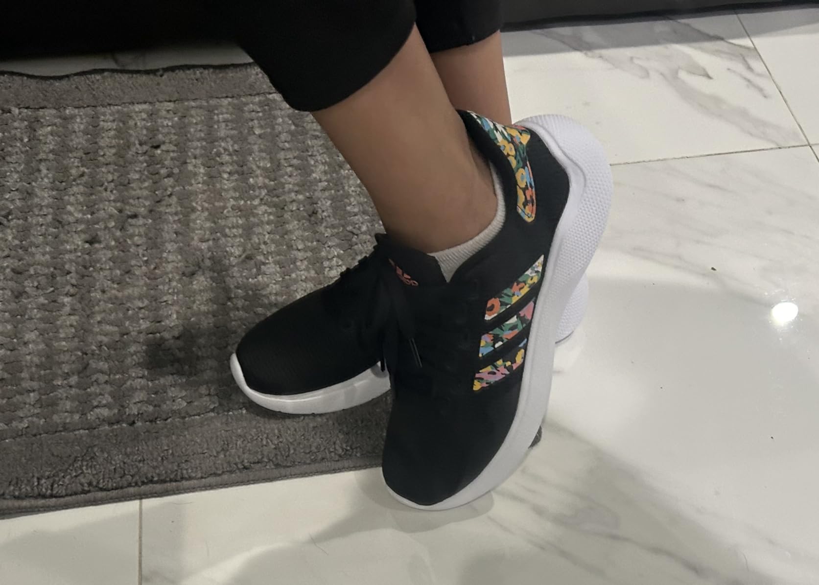 Adidas Puremotion colorway showing breathable mesh upper and comfortable sockliner design