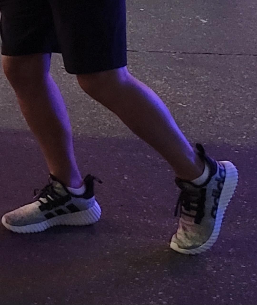 Adidas Kaptir 3.0 side profile showing linear branding and heel badge detail