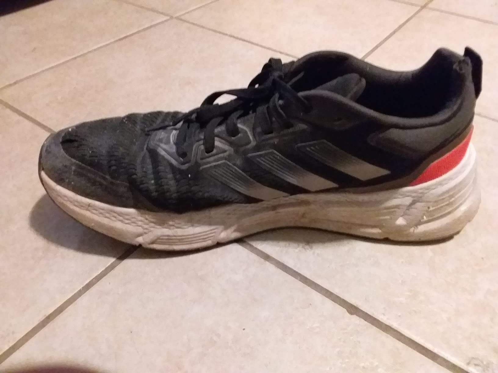 Adidas Questar being worn during construction work showing real-world durability testing