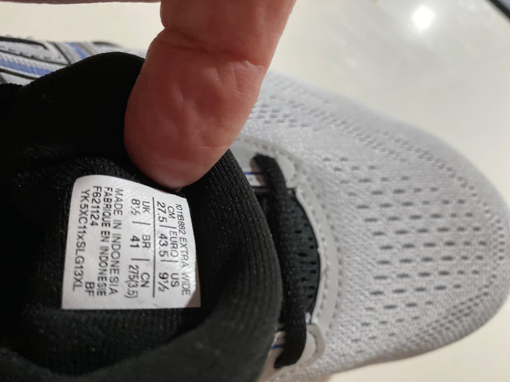 ASICS Gel-Contend 9 fit comparison showing extra wide sizing accommodation