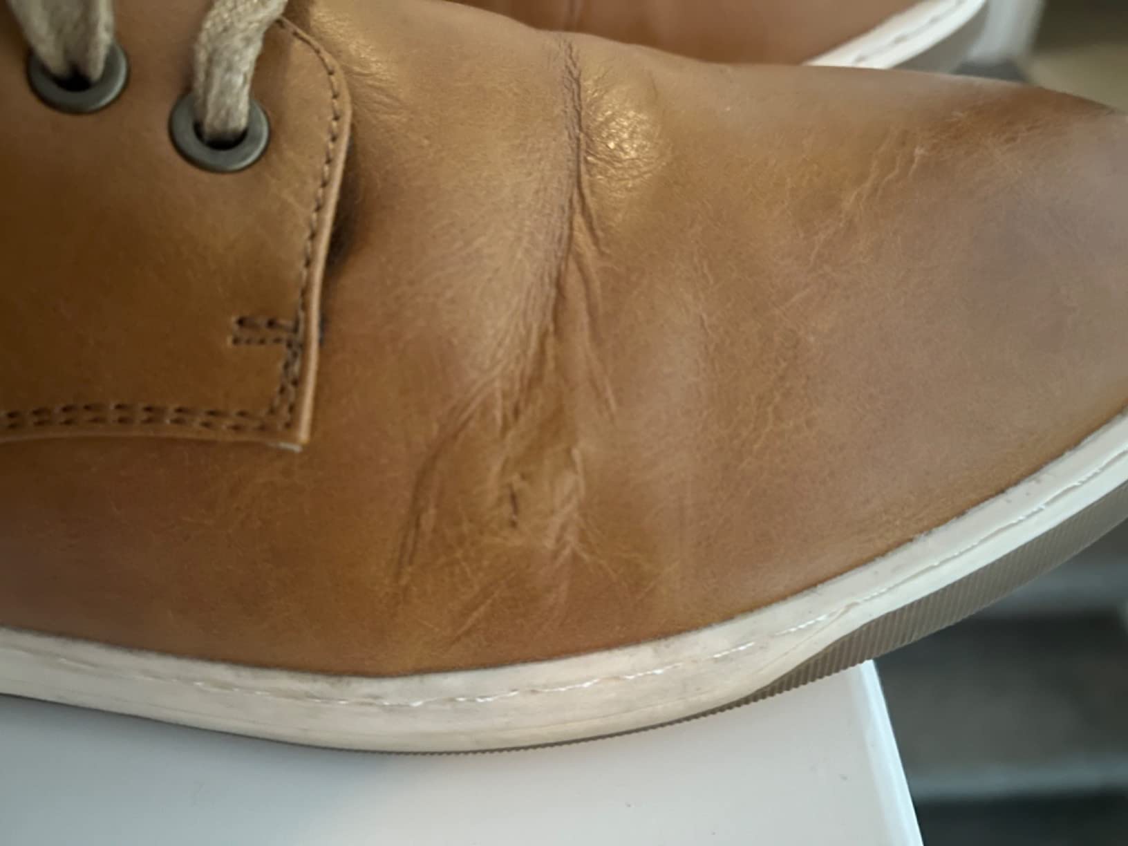 Comparison showing Jousen dress sneaker deterioration after 6 months of regular office wear