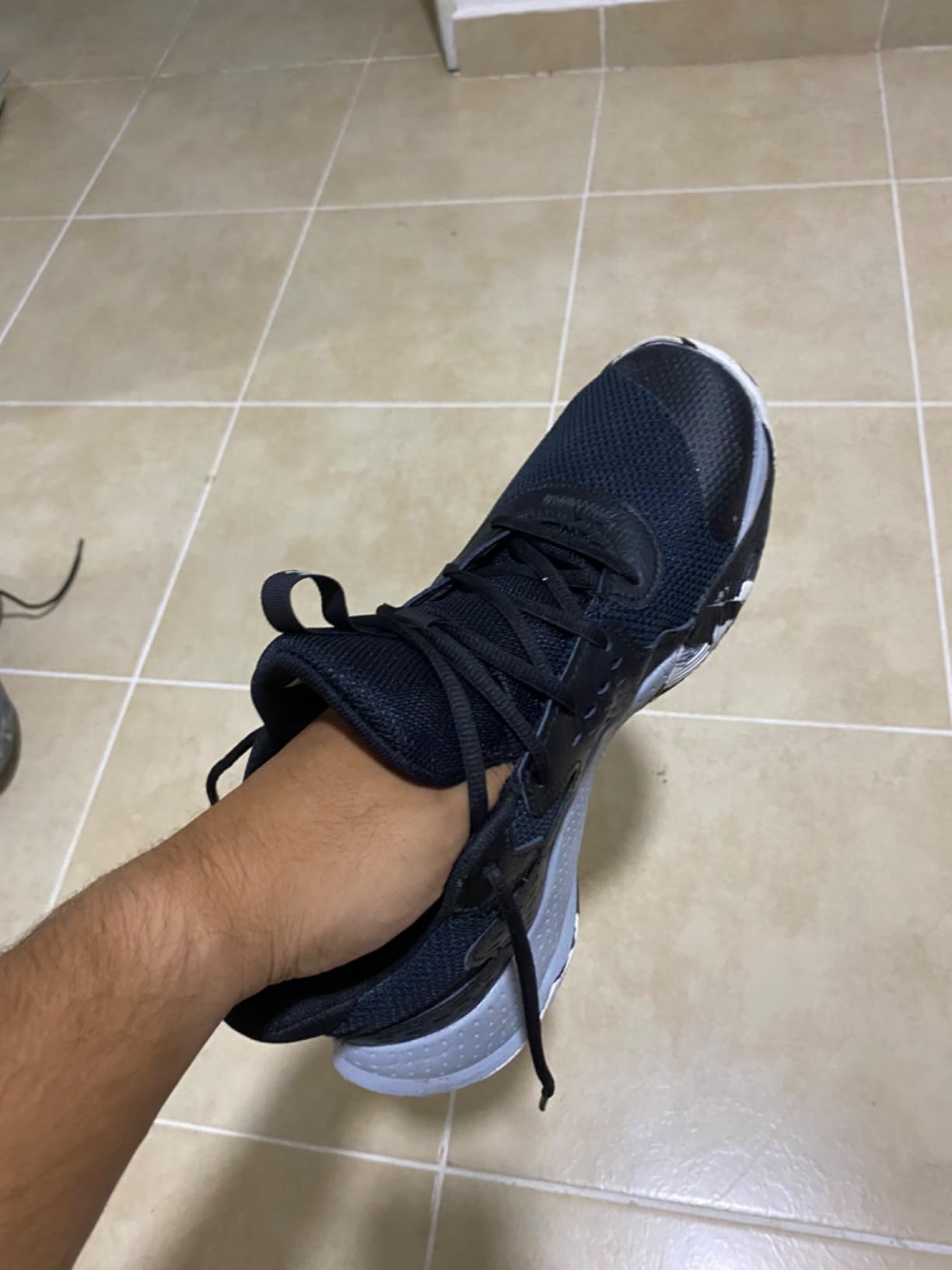 Close-up view of Under Armour Jet 23 upper construction showing mixed material durability features