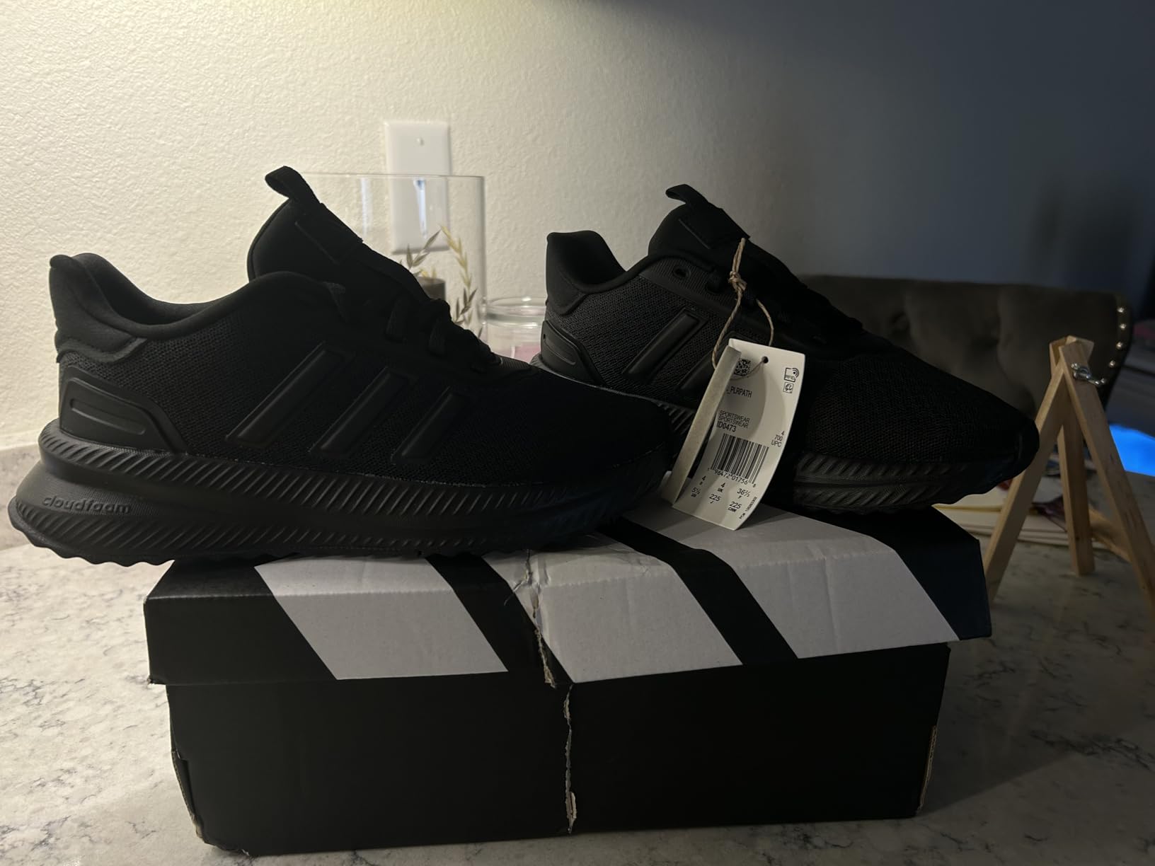 Adidas X_PLR Path on-foot styling showing versatility with casual outfits