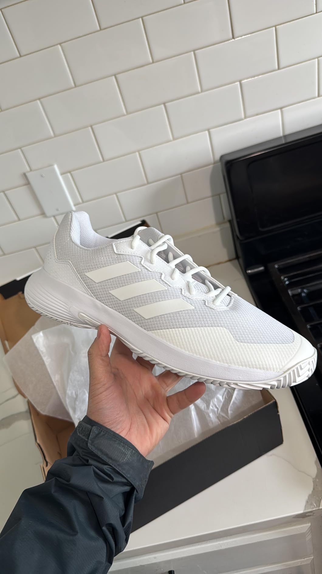 Adidas Gamecourt 2.0 tennis shoes in action on court showing traction pattern