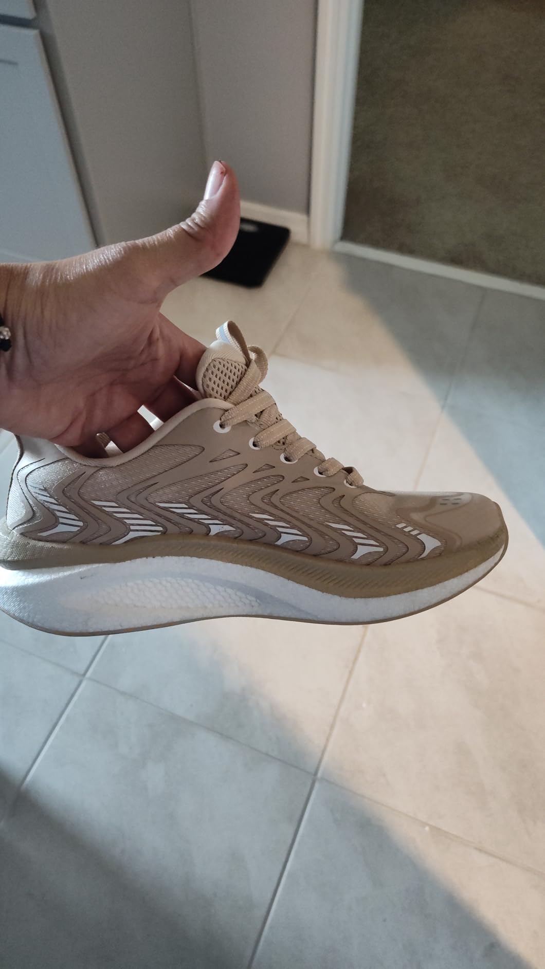 Close-up view of ALLSWIFIT shoe construction showing mesh upper and TPU midsole technology