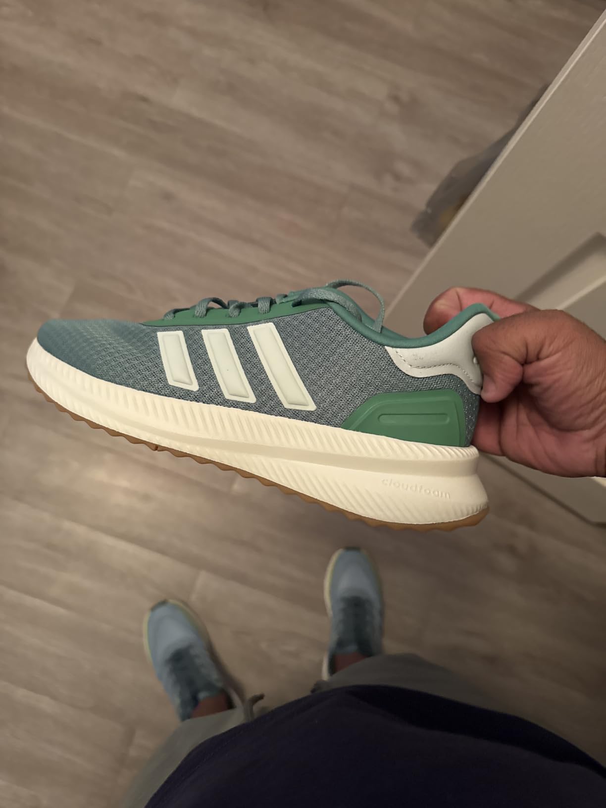 Close-up detail of Adidas X_PLR Path mesh upper construction and synthetic overlays