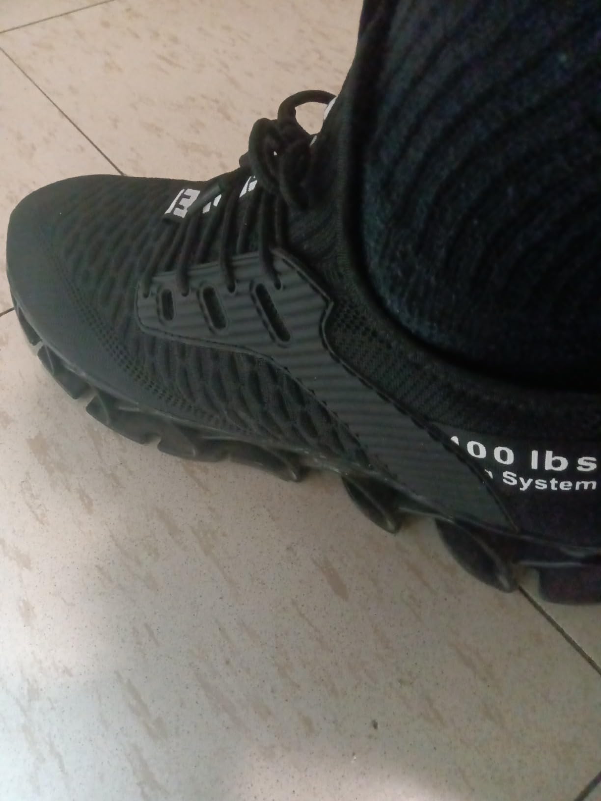 Bottom sole view highlighting traction pattern and material composition