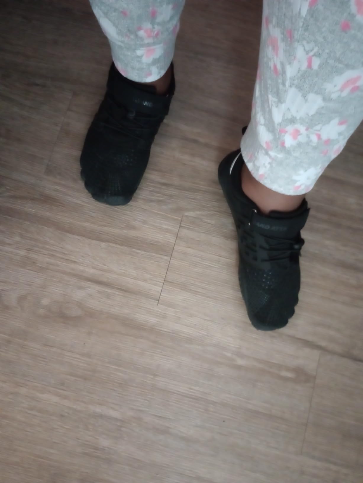 Close-up of Grand Attack barefoot shoes showing wide toe box and flexible sole construction