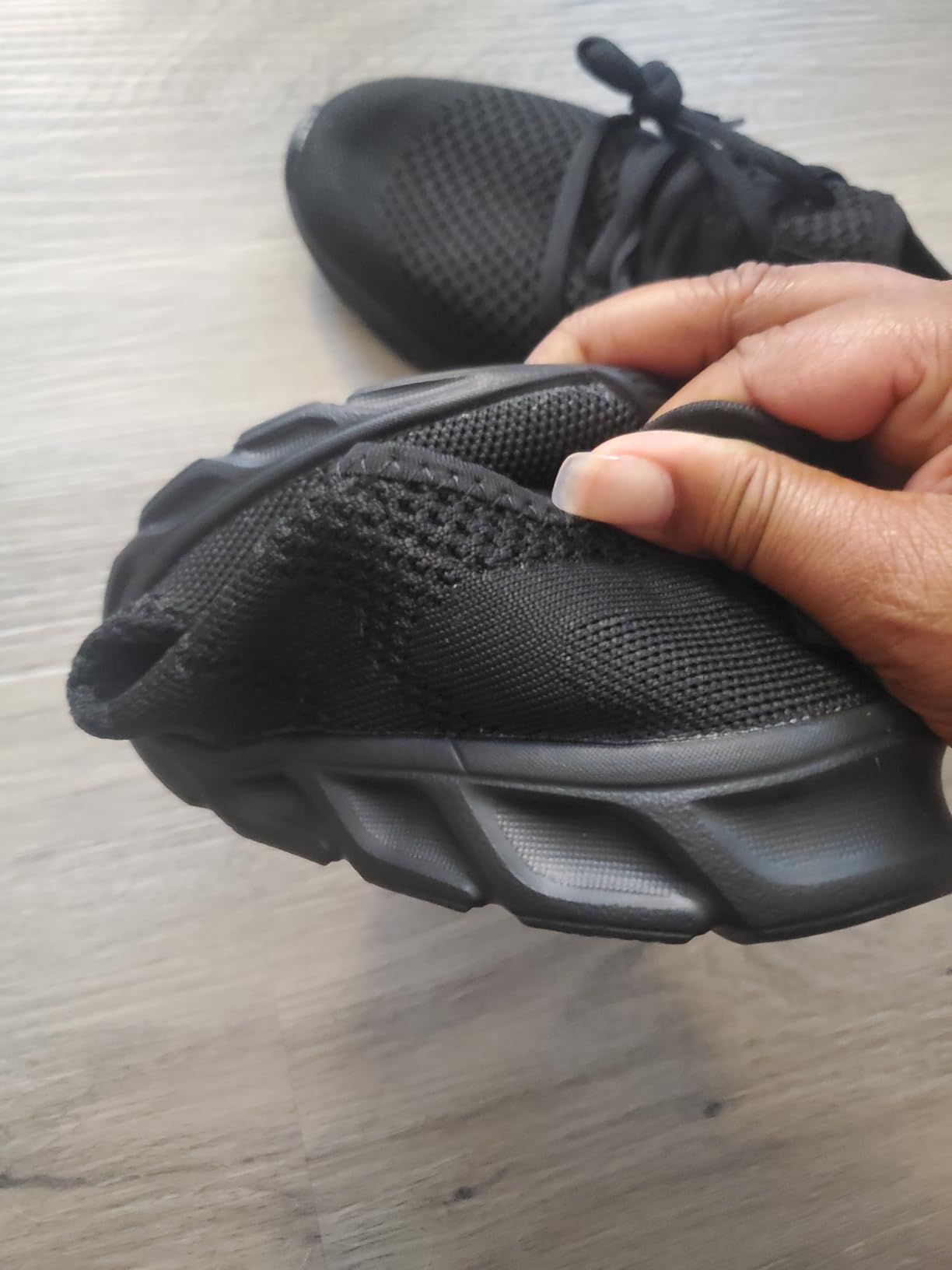 Tvtaop sneakers showing sole pattern and overall construction from bottom view