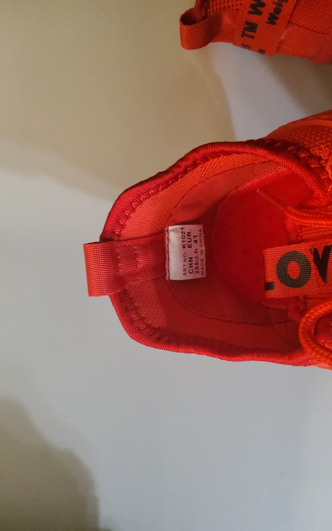 Side profile showing air cushion segments and overall sneaker silhouette