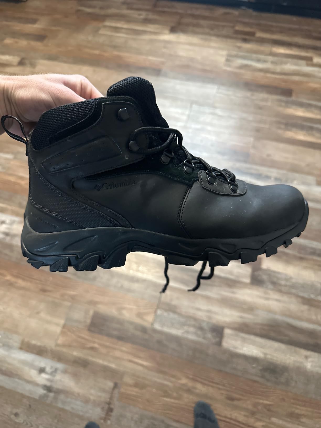 Columbia Newton Ridge hiking boots on outdoor trail showcasing real-world performance