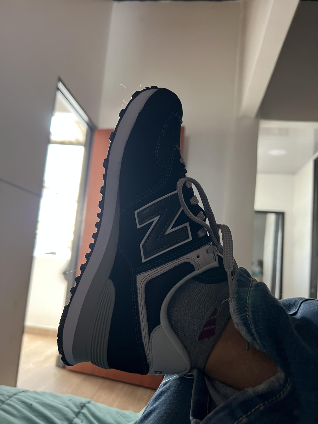 New Balance 574 Core detail shot showing mesh upper construction and classic N logo
